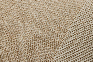 Ivory / Beige Pillow shown from a different angle to reveal its pattern.
