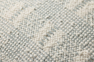 Ivory / Blue Pillow shown from a different angle to reveal its pattern.