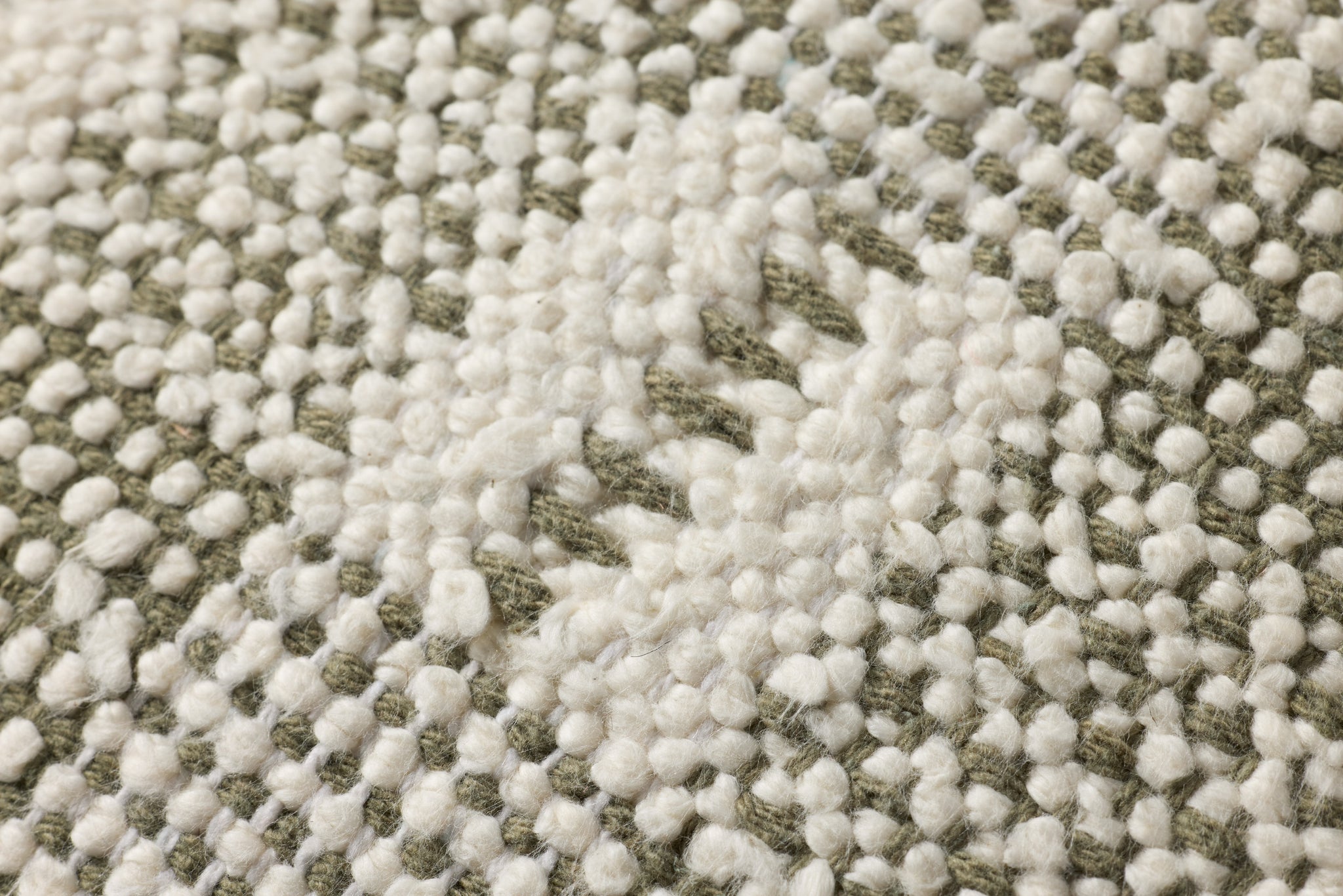 Ivory / Green Pillow (Pattern 1) shown from a different angle to reveal its pattern.