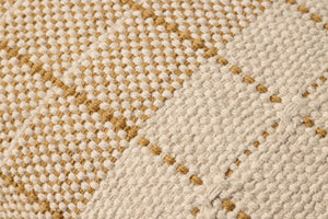 Natural / Yellow Pillow shown from a different angle to reveal its pattern.