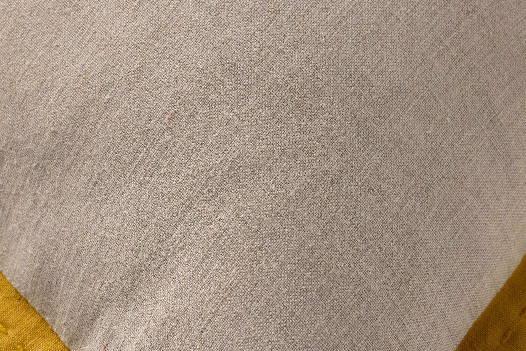 Natural / Mustard Pillow shown from a different angle to reveal its pattern.