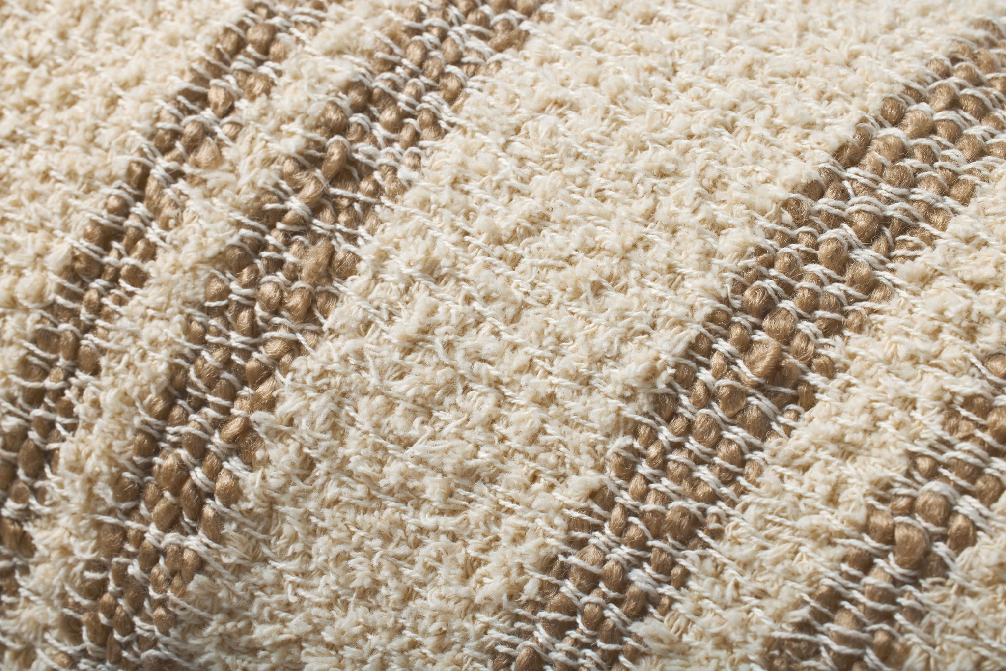 Natural / Tan Pillow shown from a different angle to reveal its pattern.