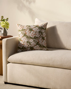 Matilda Olive / Orange Pillow shown from a different angle to reveal its pattern.