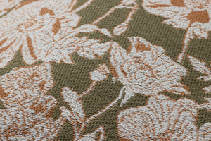 Matilda Olive / Orange Pillow shown from a different angle to reveal its pattern.