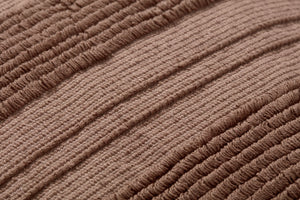 Kristy Clay Pillow shown from a different angle to reveal its pattern.