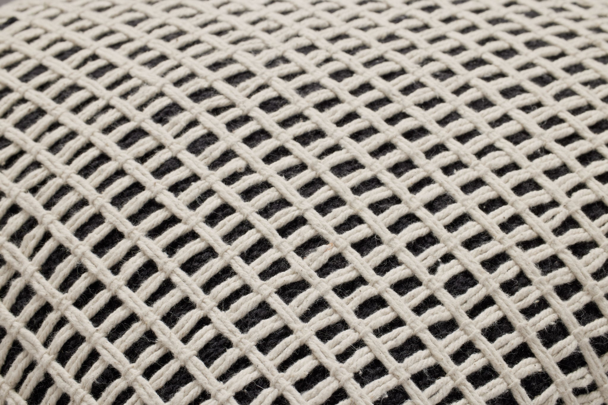 Black / Ivory Pillow shown from a different angle to reveal its pattern.