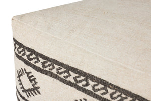 Ivory / Brown Pouf shown from a different angle to reveal its pattern.