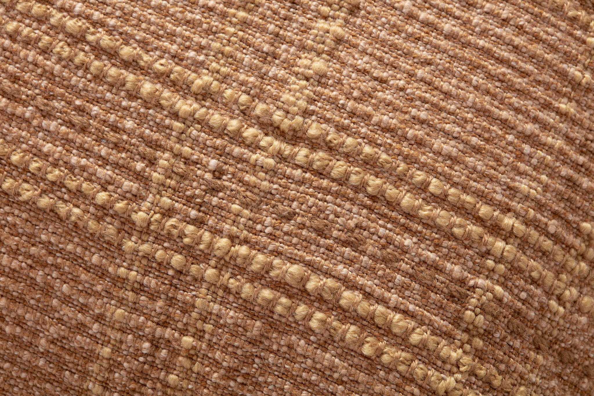 Calista Terracotta Pillow shown from a different angle to reveal its pattern.