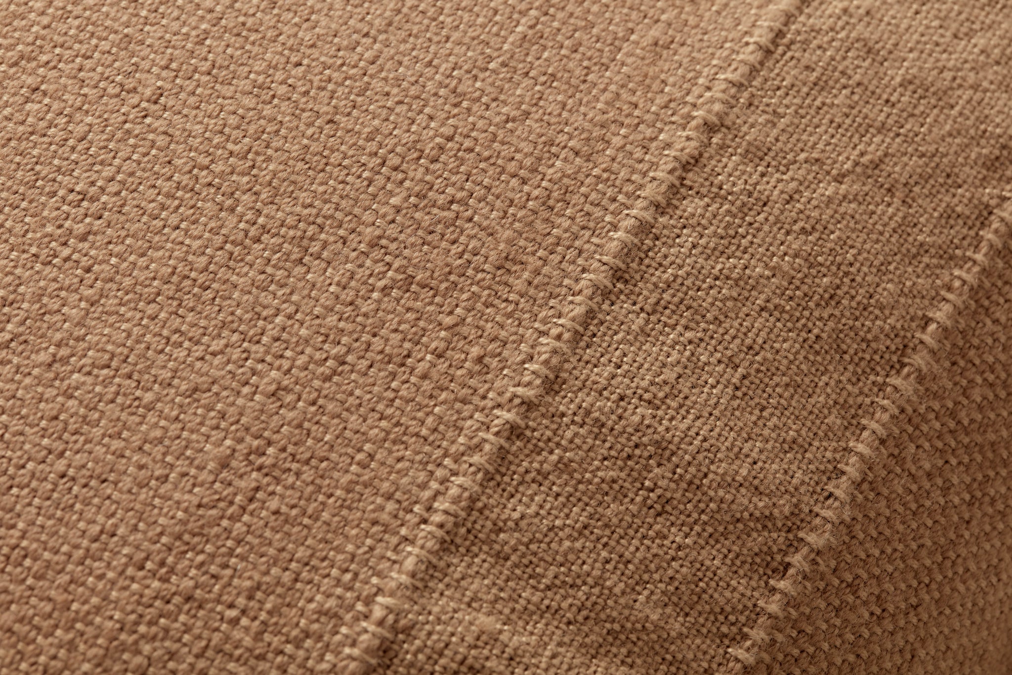 Nadine Terracotta Pillow shown from a different angle to reveal its pattern.