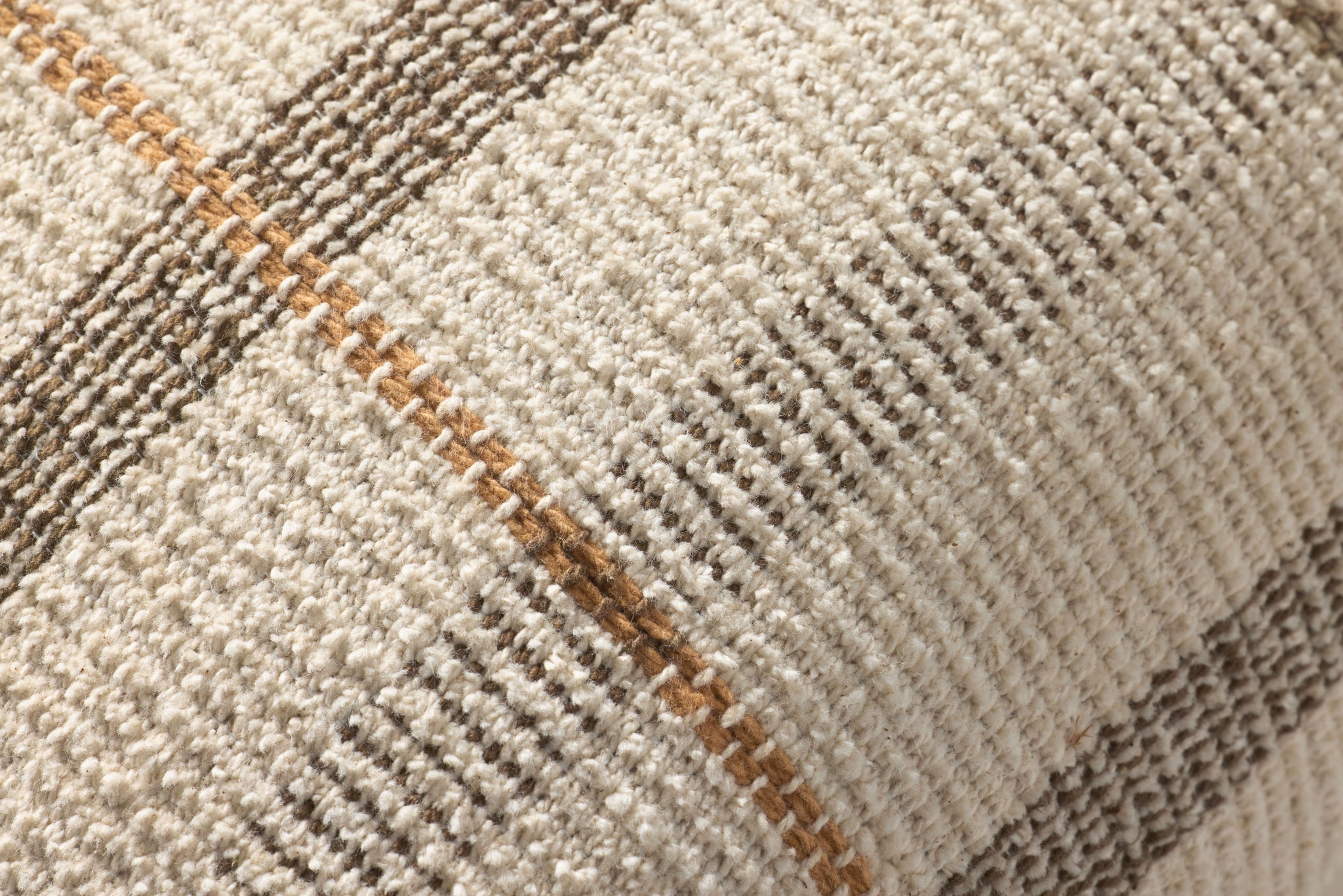 Ivory / Brown Pillow shown from a different angle to reveal its pattern.