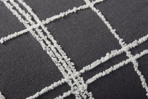Bernadette Graphite / Ivory Pillow shown from a different angle to reveal its pattern.