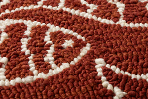 Red Pillow (Pattern 3) shown from a different angle to reveal its pattern.