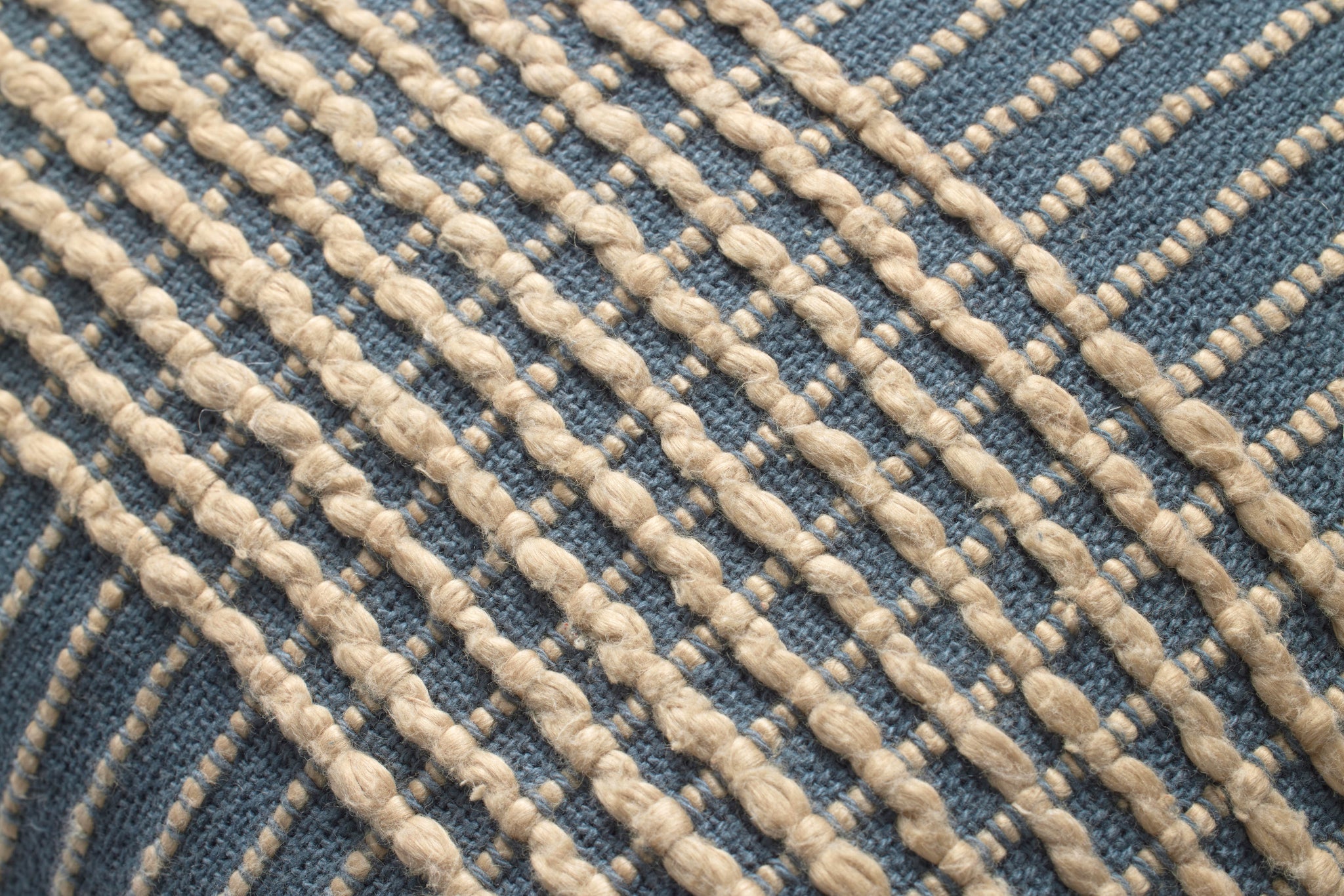 Sophia Blue Pillow shown from a different angle to reveal its pattern.