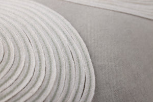 Taupe / Natural Pillow shown from a different angle to reveal its pattern.