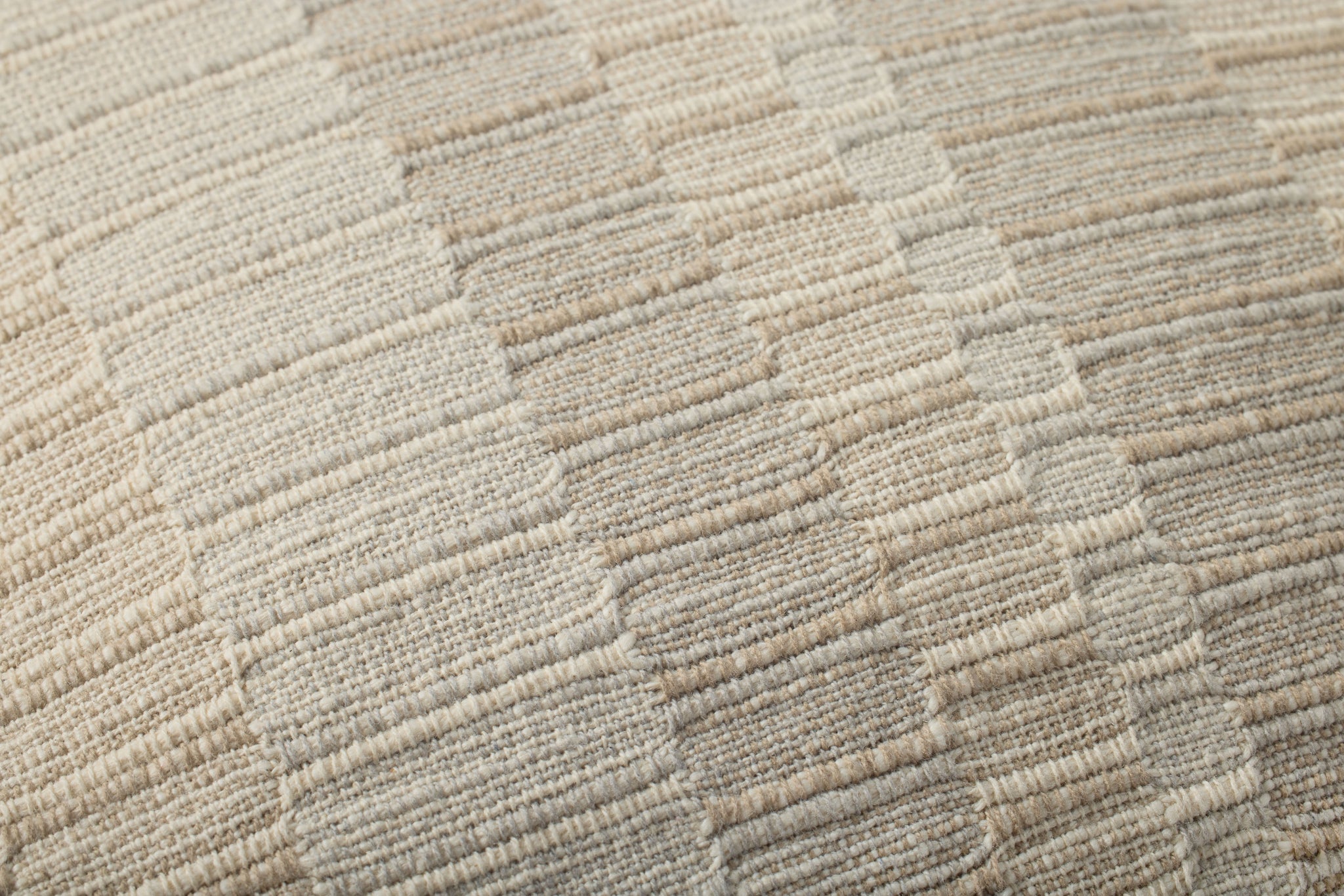 Natural / Ivory Pillow (Pattern 1) shown from a different angle to reveal its pattern.