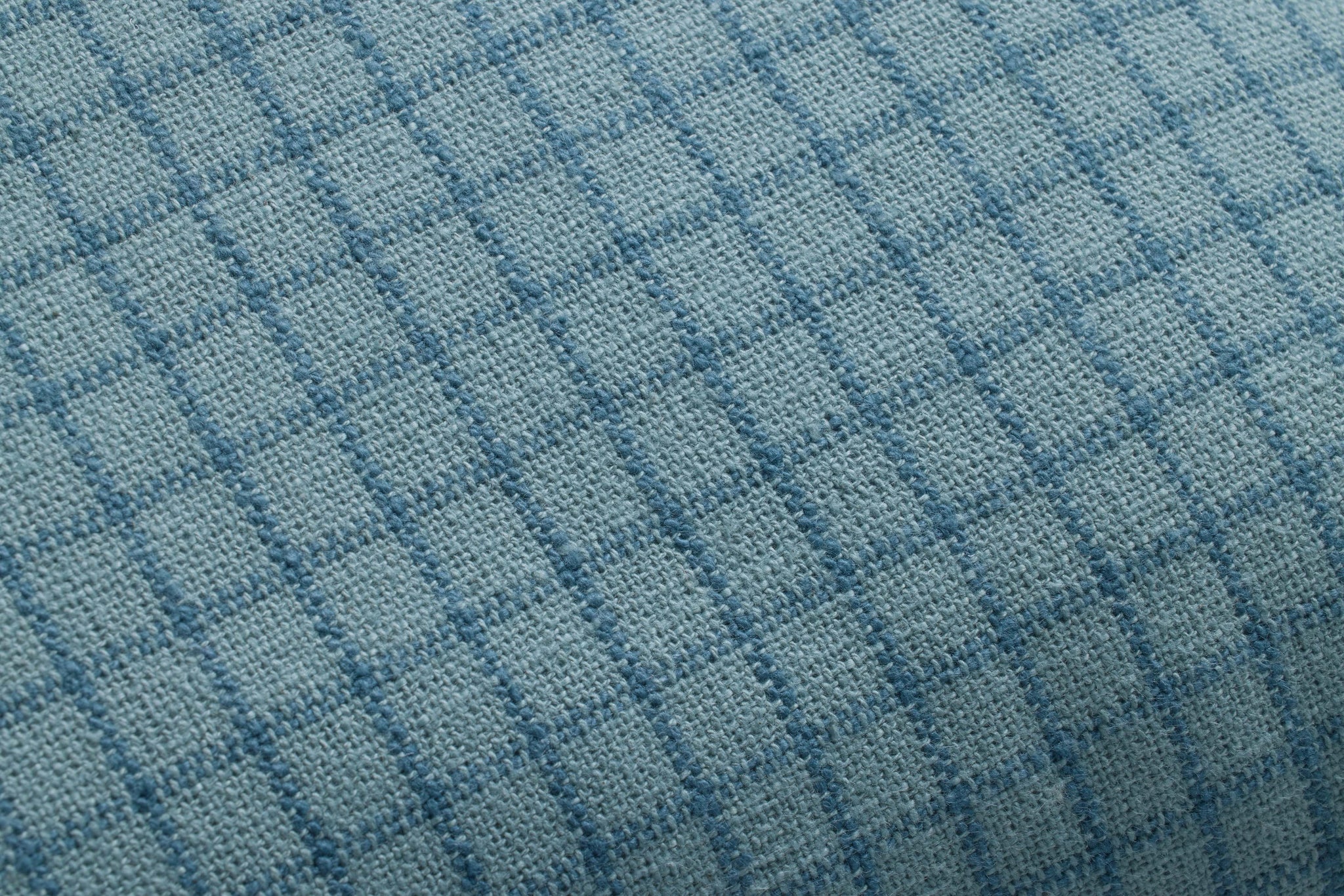 Dinah Ocean / Blue Pillow shown from a different angle to reveal its pattern.