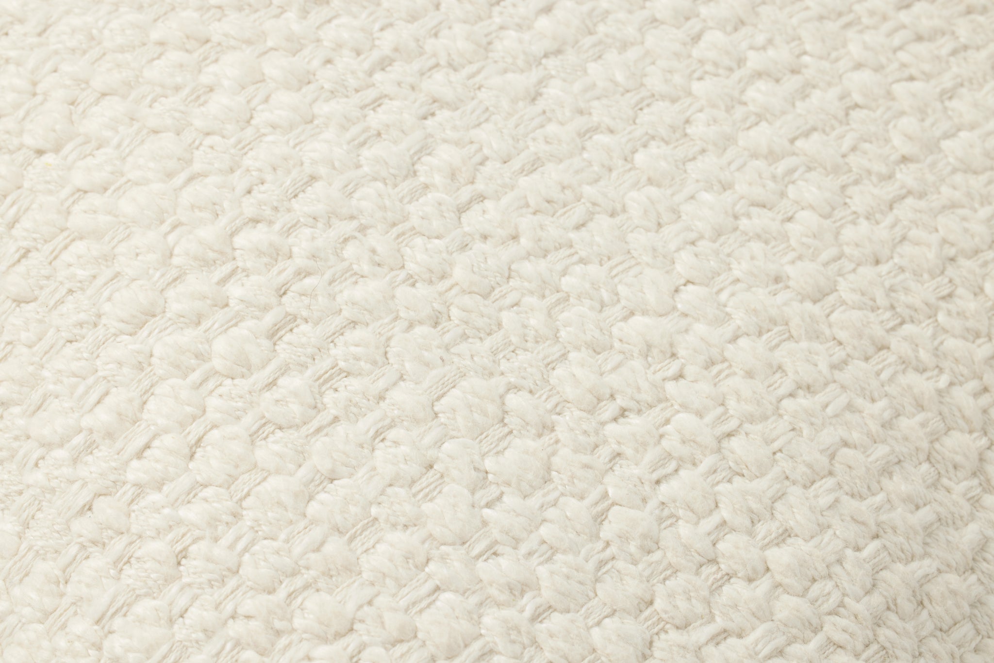 Ivory Pillow (Pattern 9) shown from a different angle to reveal its pattern.