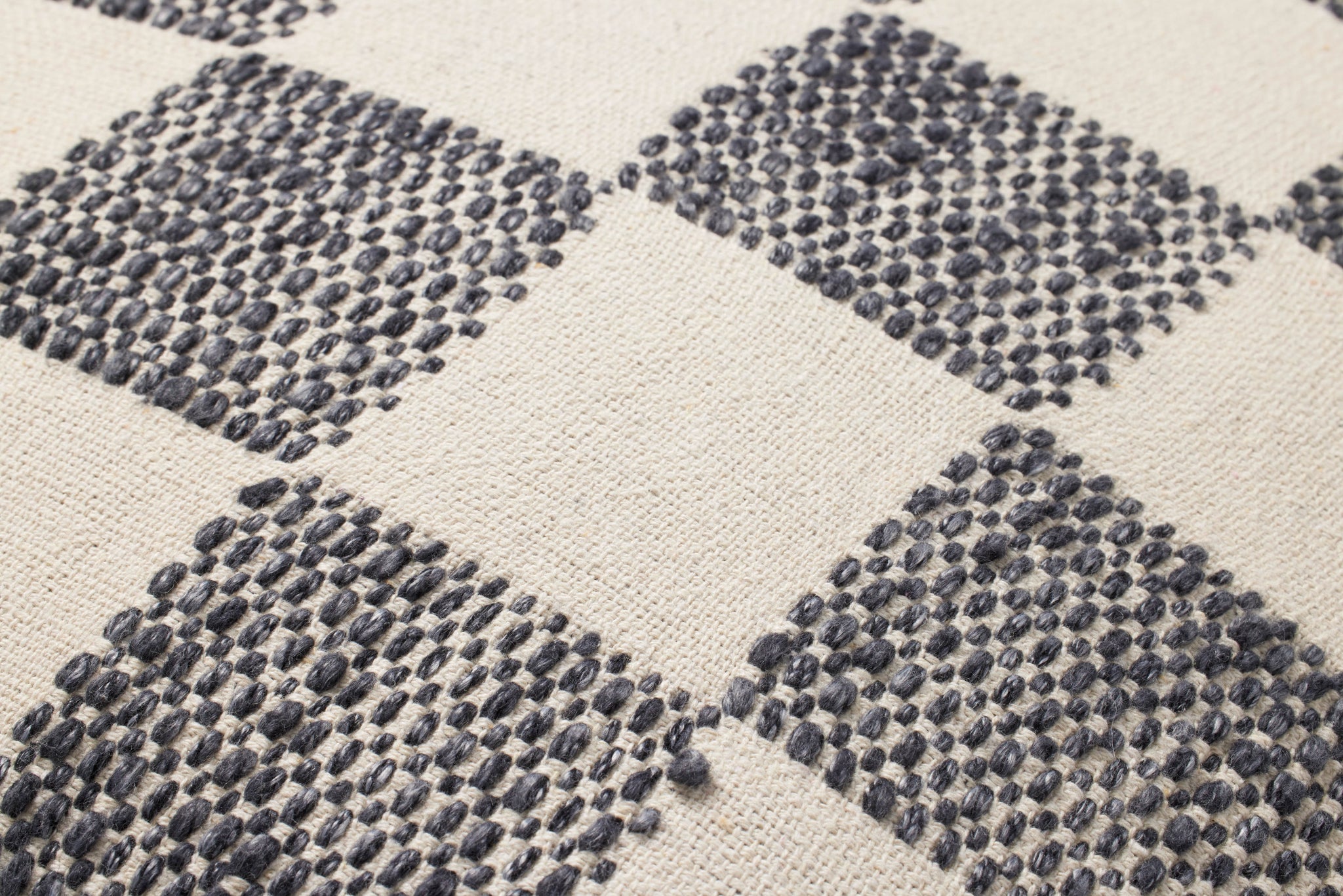 Black Pillow (Pattern 4) shown from a different angle to reveal its pattern.