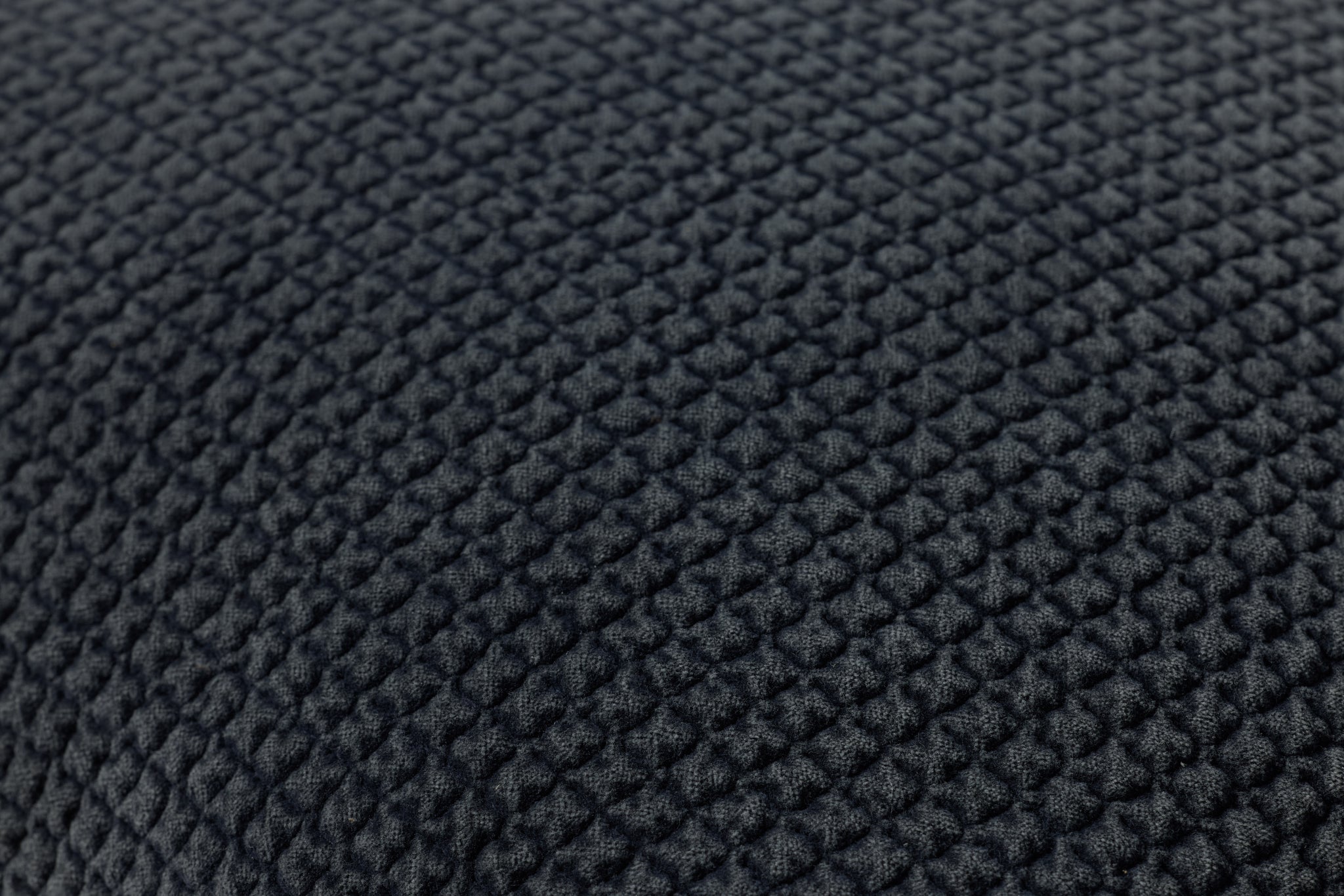 Dark Navy Pillow shown from a different angle to reveal its pattern.