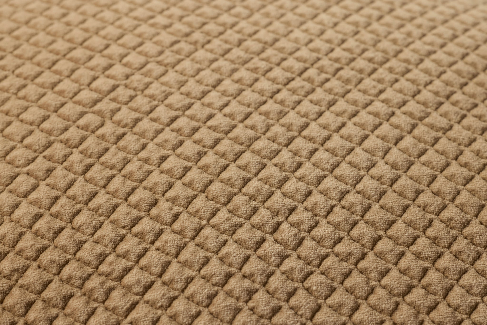 Tan Pillow (Pattern 3) shown from a different angle to reveal its pattern.