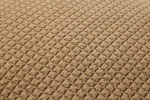 Tan Pillow (Pattern 3) shown from a different angle to reveal its pattern.