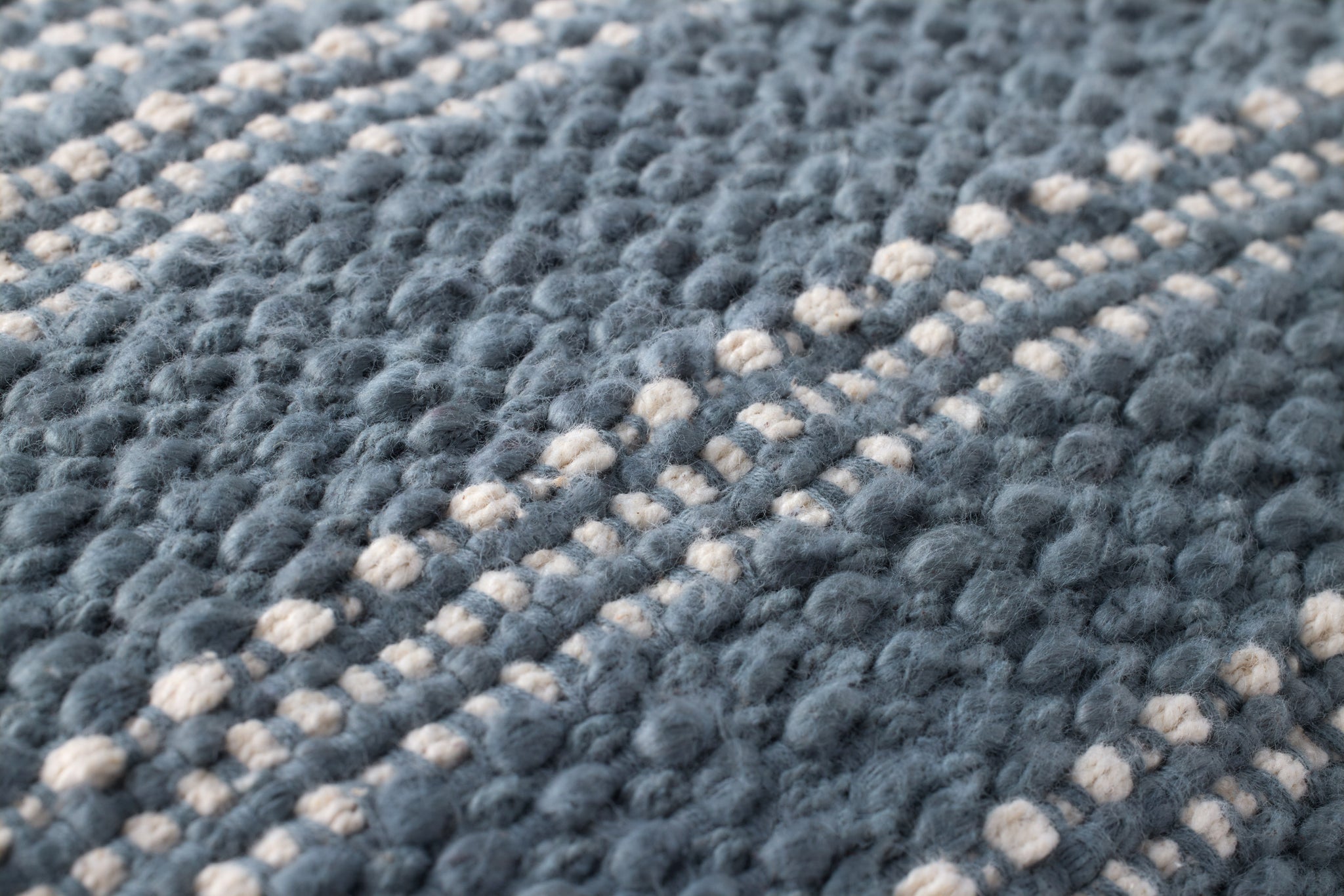 Blue / Ivory Pillow (Pattern 3) shown from a different angle to reveal its pattern.