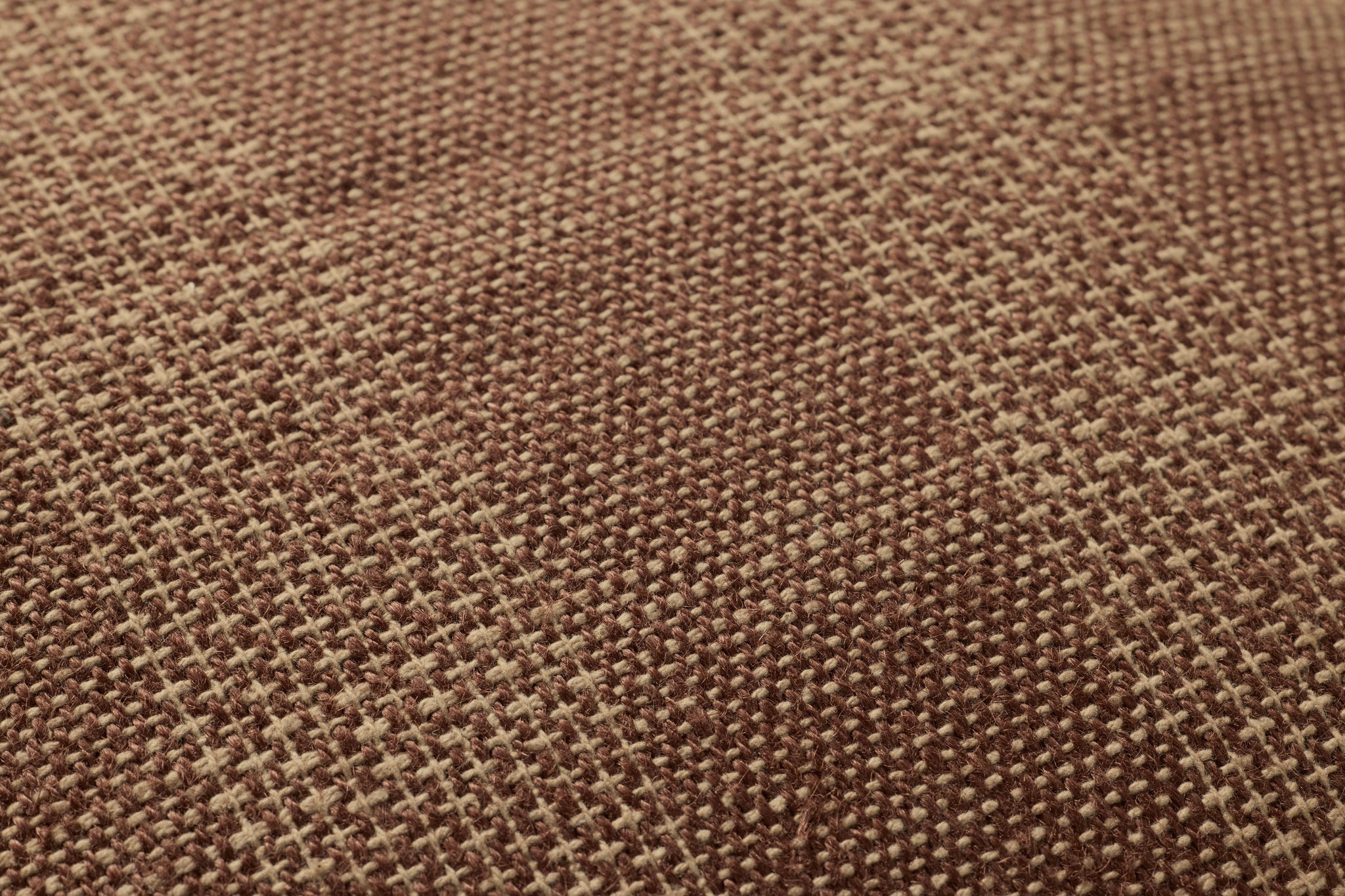 Brown / Tan Pillow shown from a different angle to reveal its pattern.