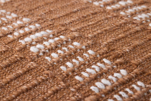 Rust / Ivory Pillow (Pattern 1) shown from another angle.
