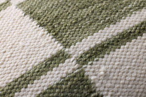 Ivory / Green Pillow (Pattern 3) shown from a different angle to reveal its pattern.