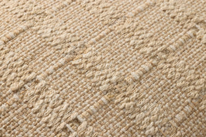 Tan Pillow (Pattern 2) shown from a different angle to reveal its pattern.