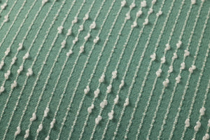 Aqua Pillow shown from a different angle to reveal its pattern.