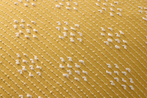 Yellow Pillow (Pattern 7) shown from a different angle to reveal its pattern.