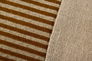 Mustard Pillow (Pattern 2) shown from a different angle to reveal its pattern.