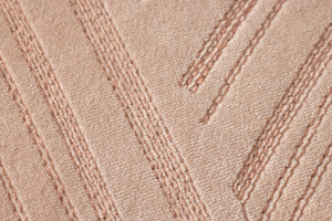 Blush Pillow (Pattern 2) shown from a different angle to reveal its pattern.