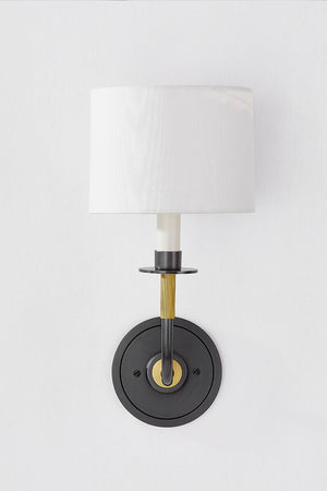 Paramus Wall Sconce shown from the front to reveal the arm curve and shade silhouette.