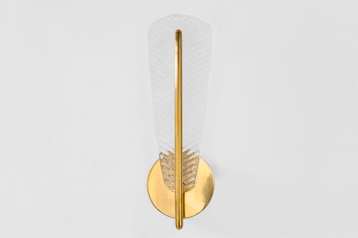 Passaic Wall Sconce in aged brass shown from a second angle to highlight the arm curve and shade silhouette.