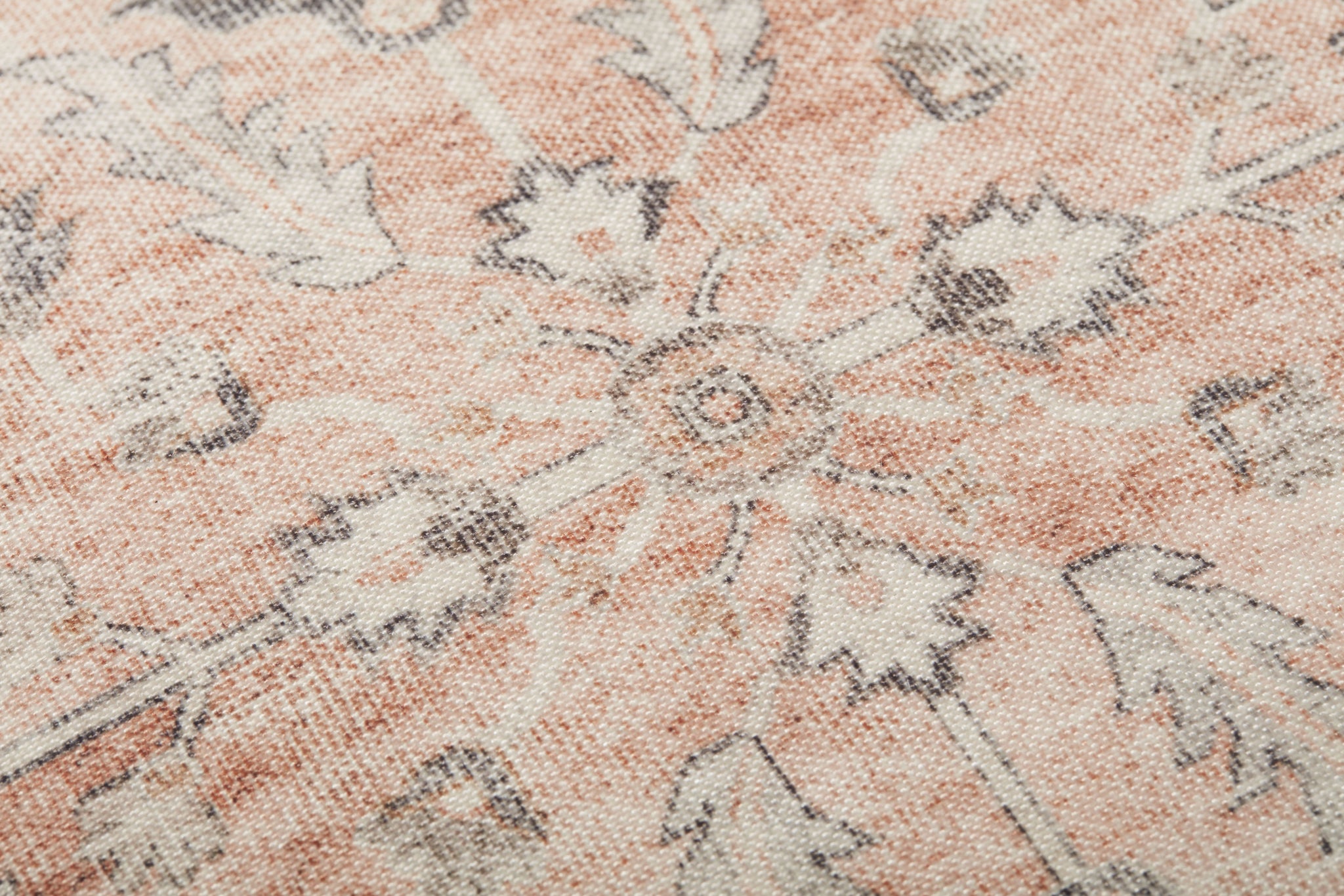 Poufs Blush / Multi shown from a different angle to reveal its pattern.