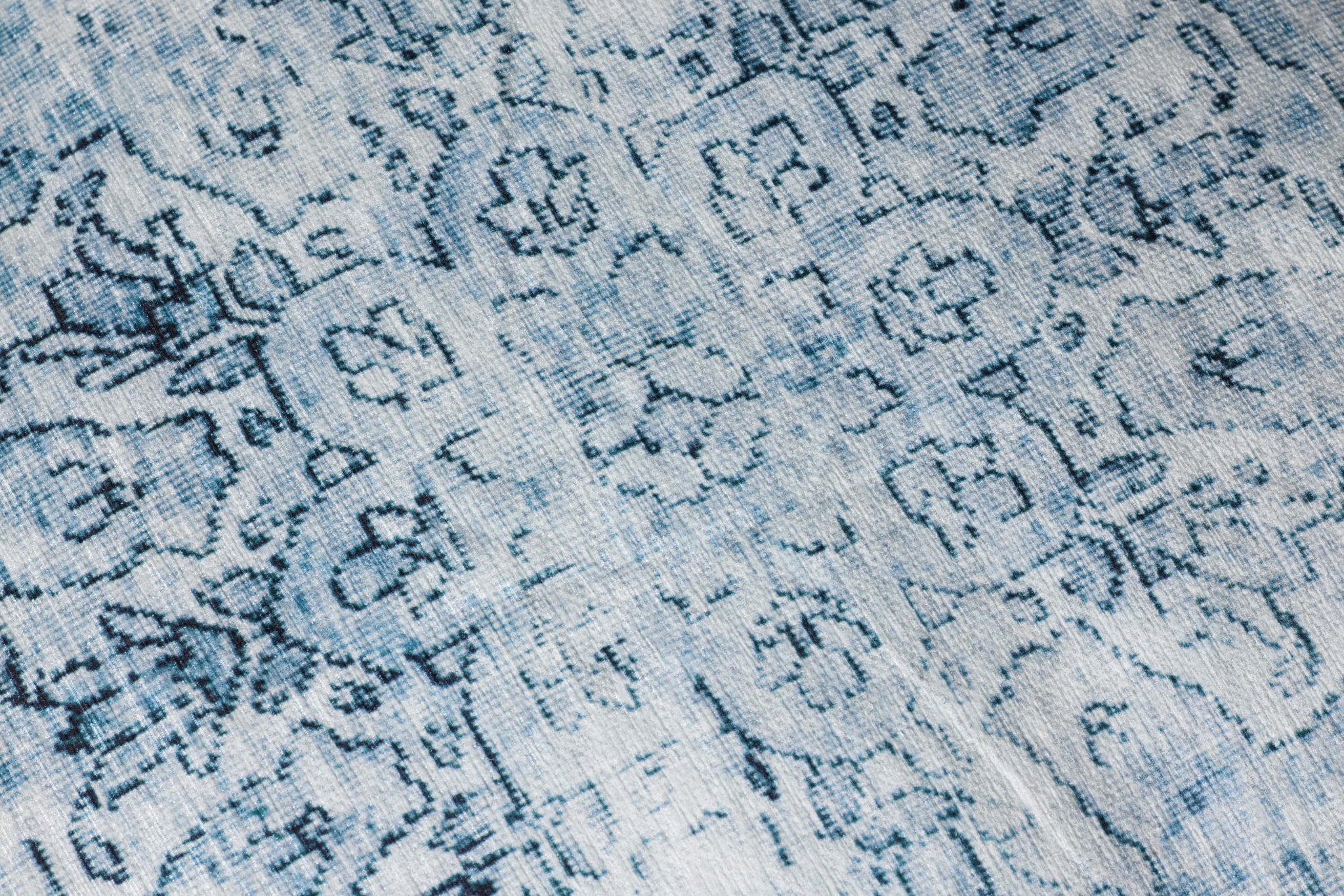 Slate Pouf shown from a different angle to reveal its pattern.