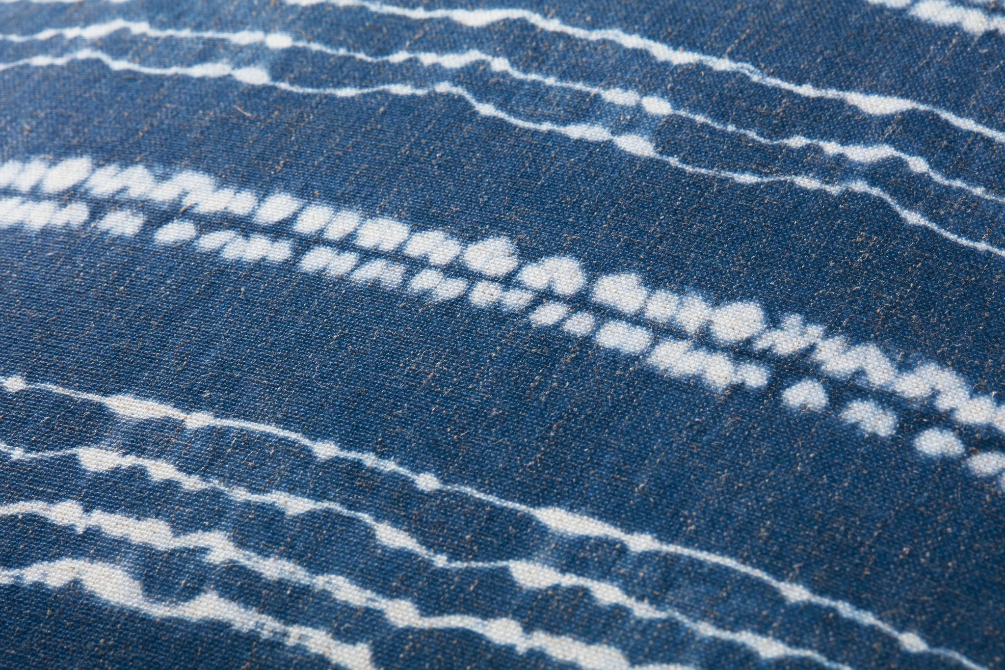 Indigo / Ivory Pouf (Pattern 1) shown from a different angle to reveal its pattern.