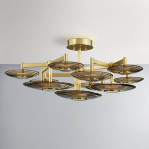 Close-up of the Griston Semi Flush 44" in aged brass showing the shade profile and mounting canopy.