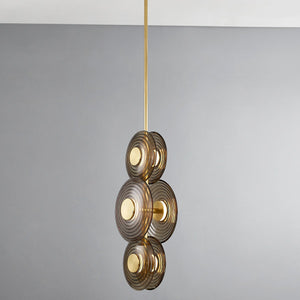 Close-up of the Griston Pendant in aged brass showing the shade shape and metal detail.