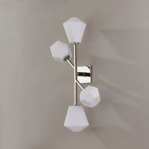 Close-up of the Tring Wall Sconce in polished nickel showing the arm curve and shade silhouette.