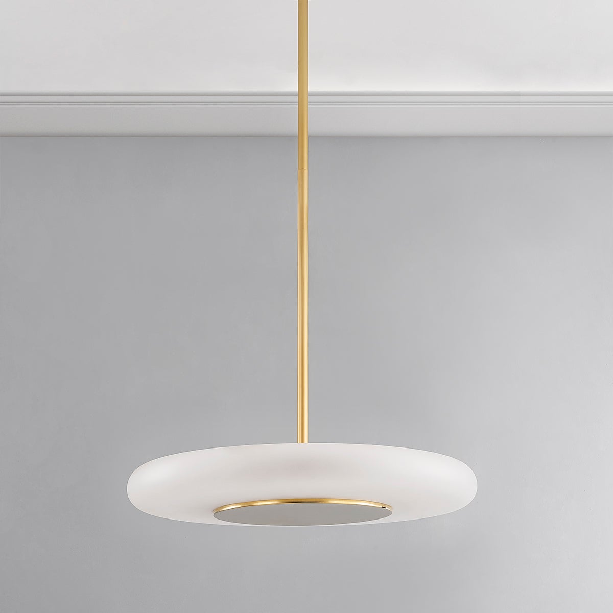 Close-up of the Blyford Pendant 20.75" in aged brass showing the shade shape and metal detail.