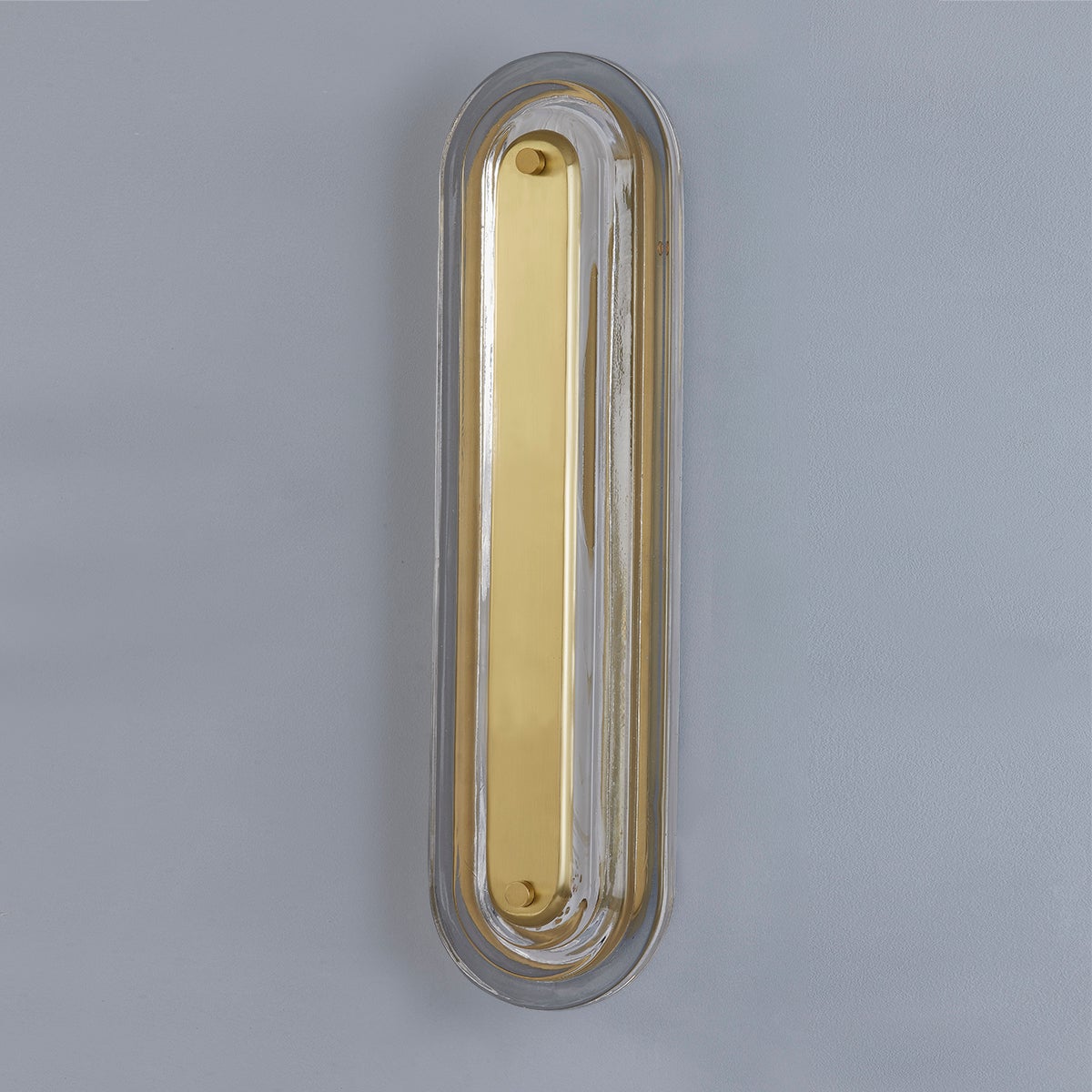 Close-up of the Litton Wall Sconce 5.75" x 21.25" in aged brass showing the arm curve and shade silhouette.