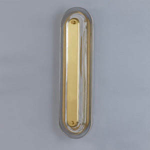 Close-up of the Litton Wall Sconce 5.75" x 21.25" in aged brass showing the arm curve and shade silhouette.