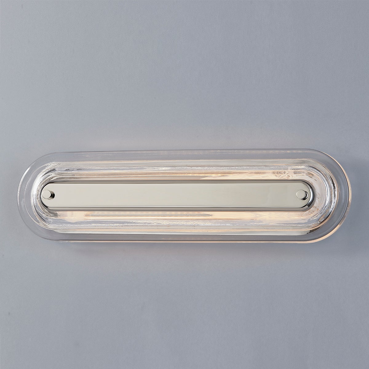 Close-up of the Litton Wall Sconce 5.75" x 21.25" in polished nickel showing the arm curve and shade silhouette.