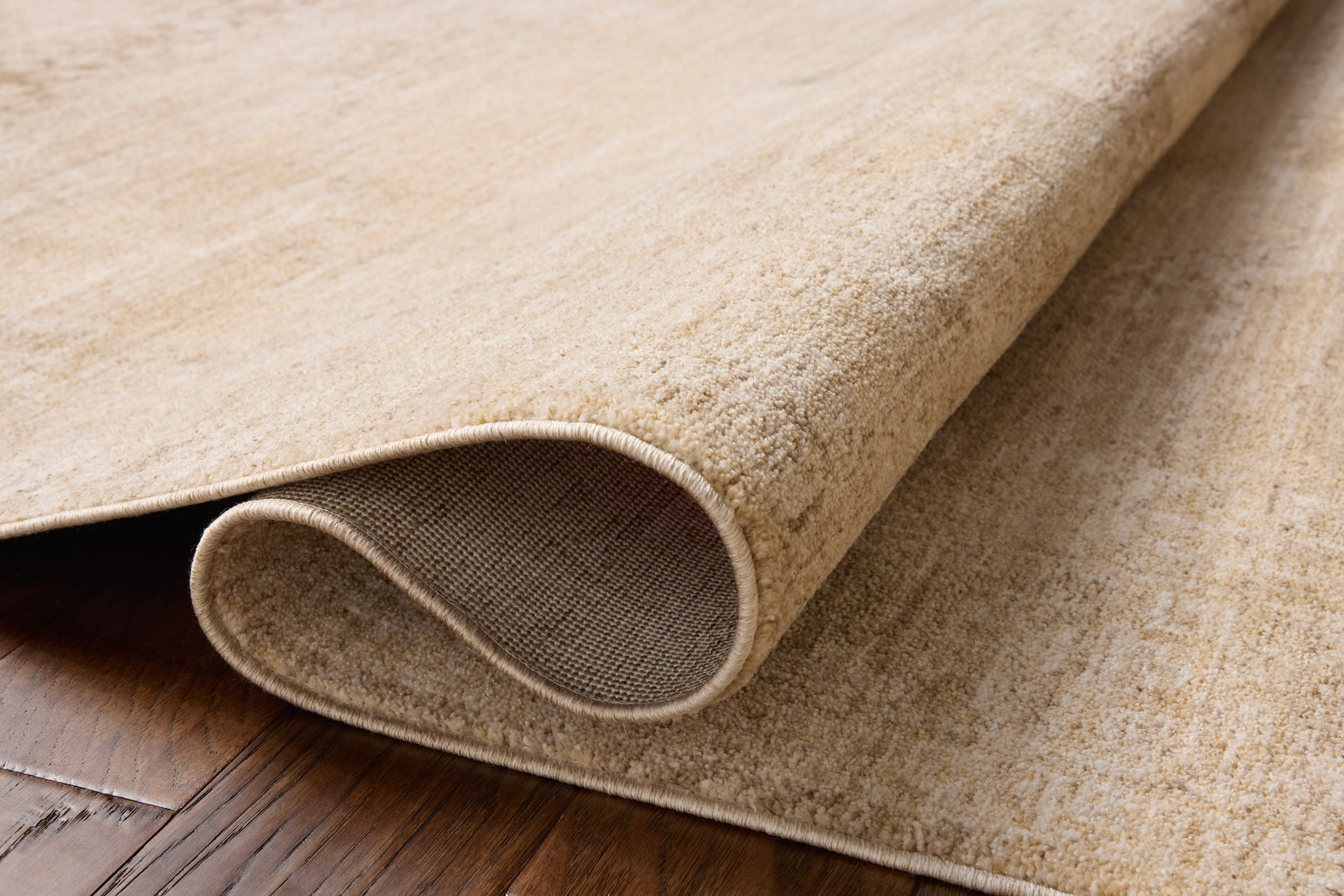 Palma Wheat / Taupe shown from a different angle to reveal its pattern.