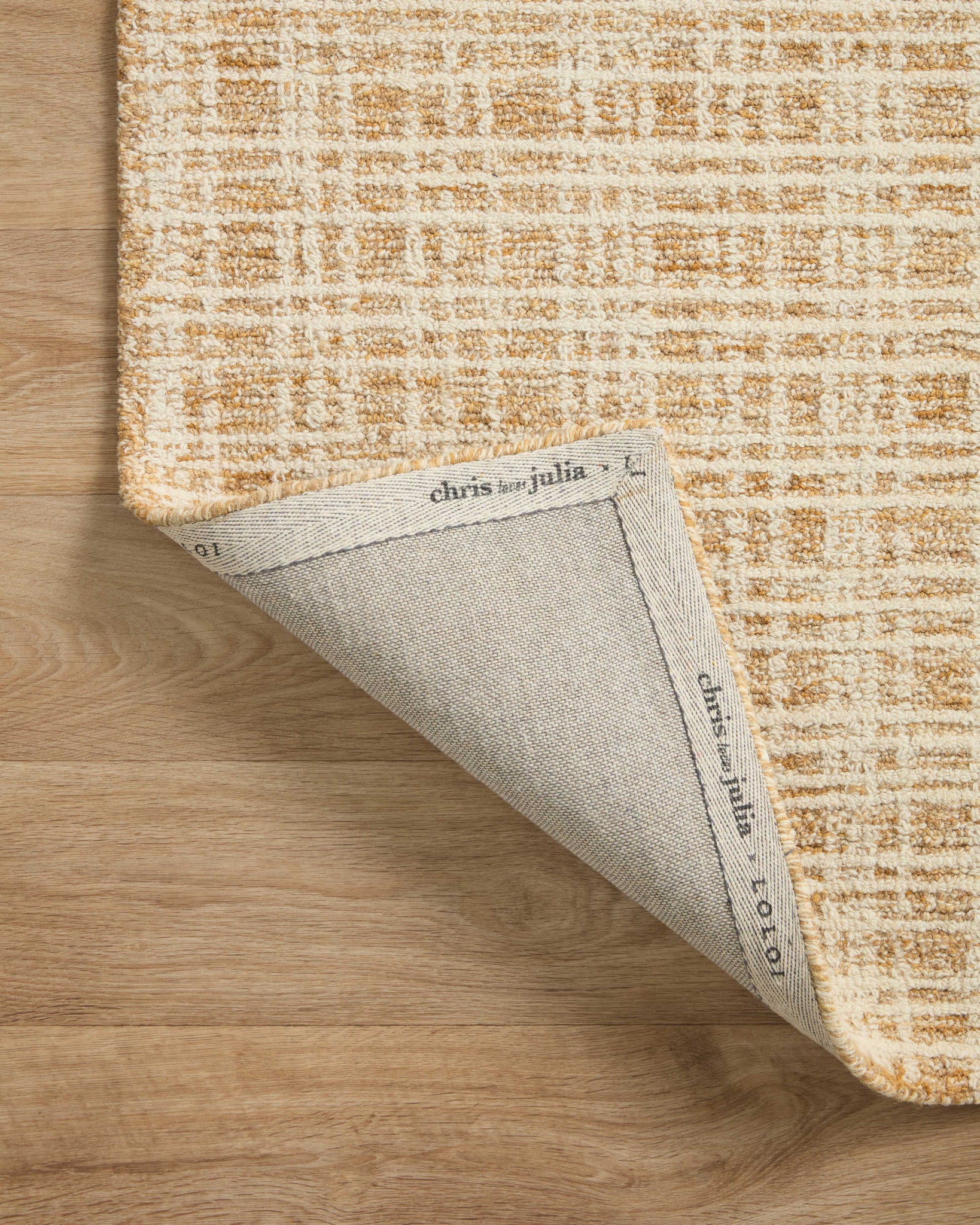 Polly Straw / Ivory shown from a different angle to reveal its pattern.