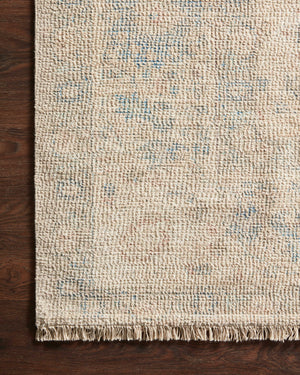 Side view of the Priya Natural / Blue rug.
