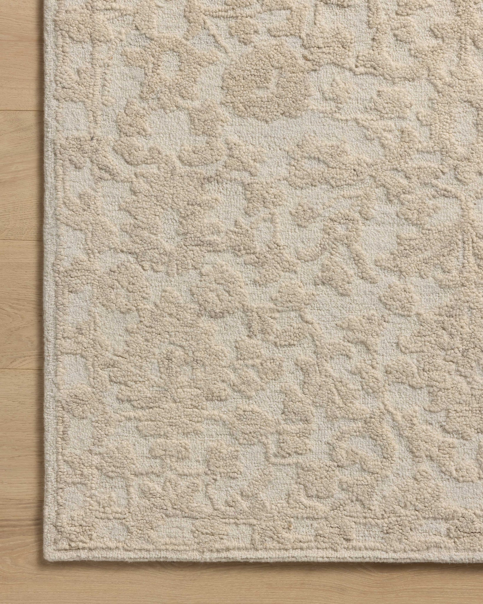 Prudence Cream / Ivory shown from a different angle to reveal its pattern.
